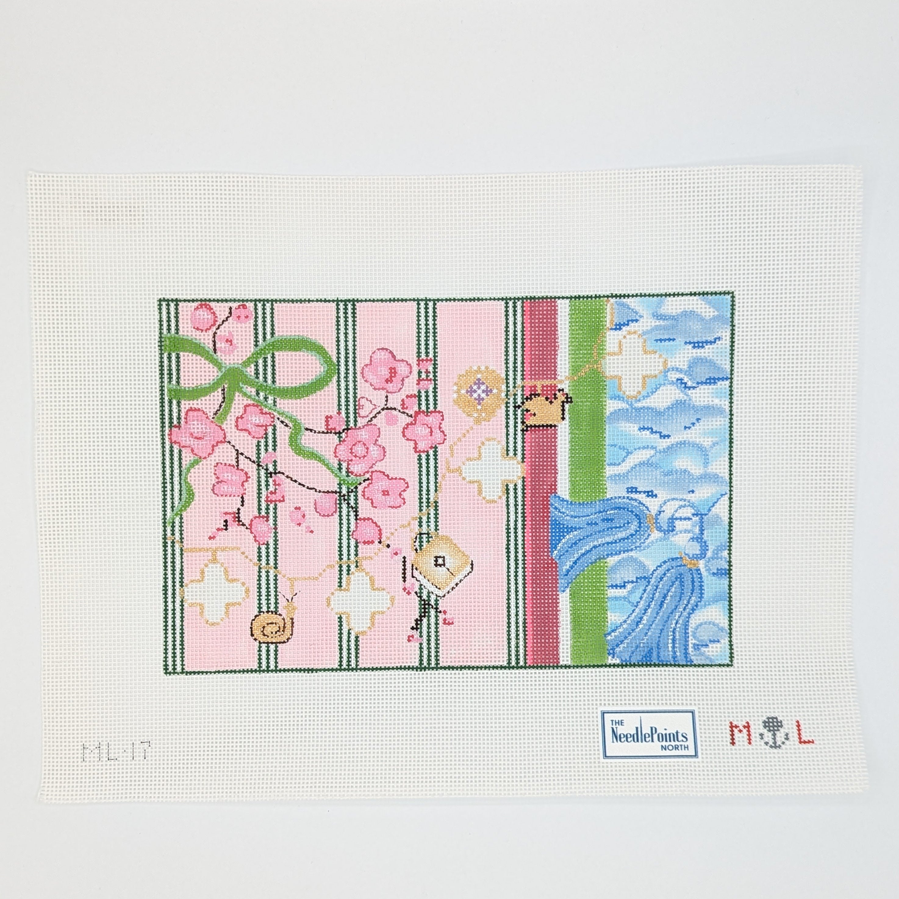 Needlepoint canvas with  spring floral and ribbon design.