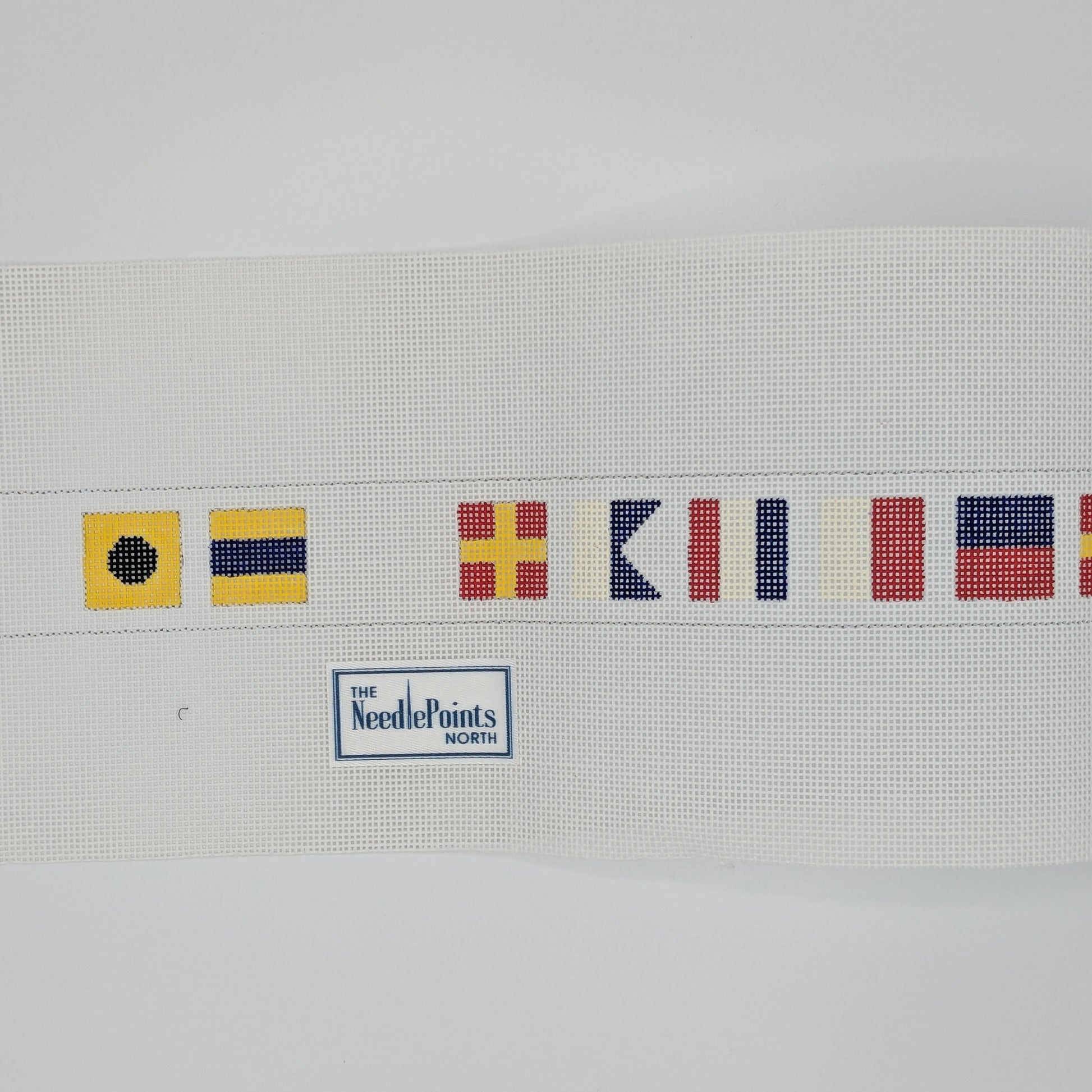 Canvas with I'd Rather Be Sailing spelled out in Flag Symbols