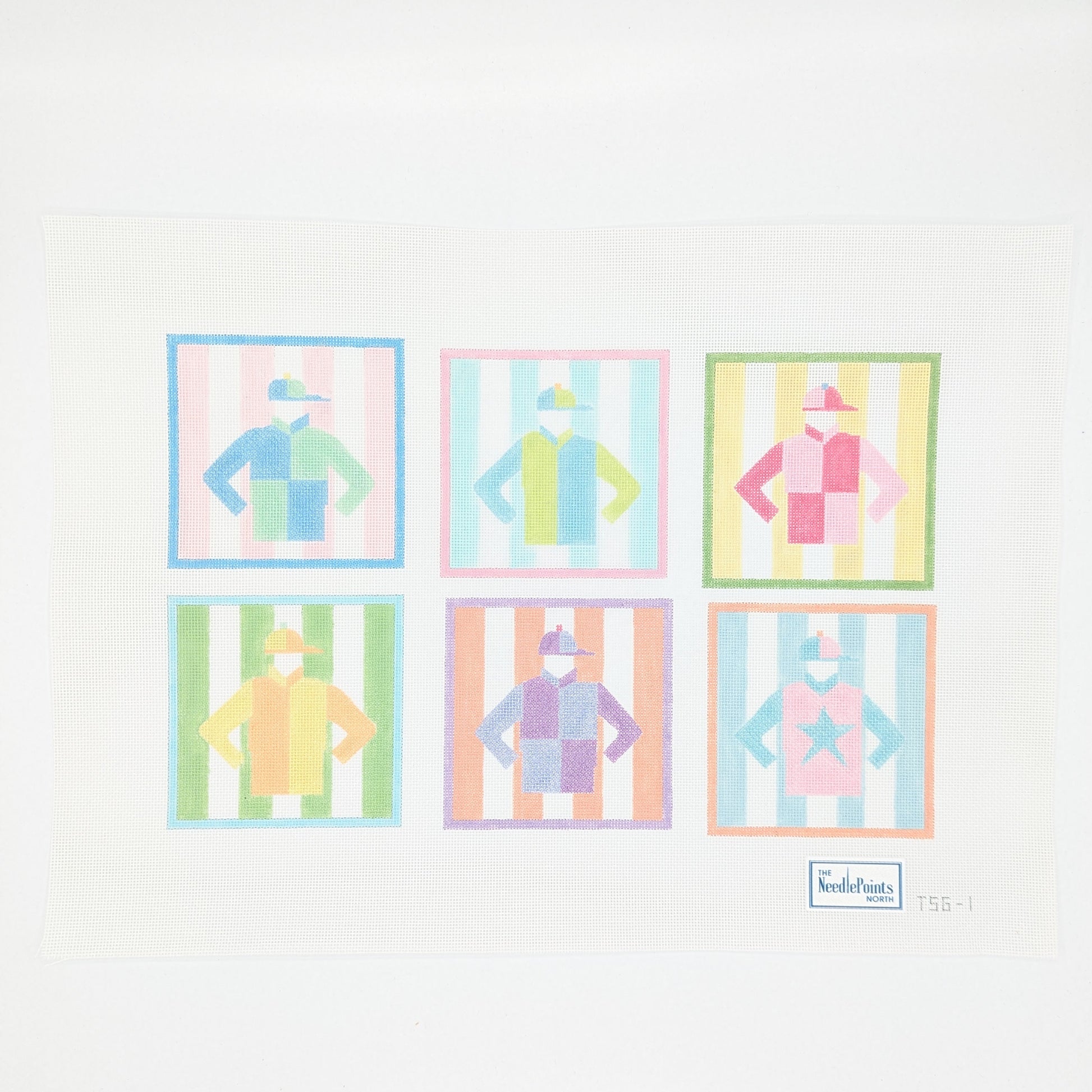 Set of six colorful jockey coasters on a needlepoint canvas