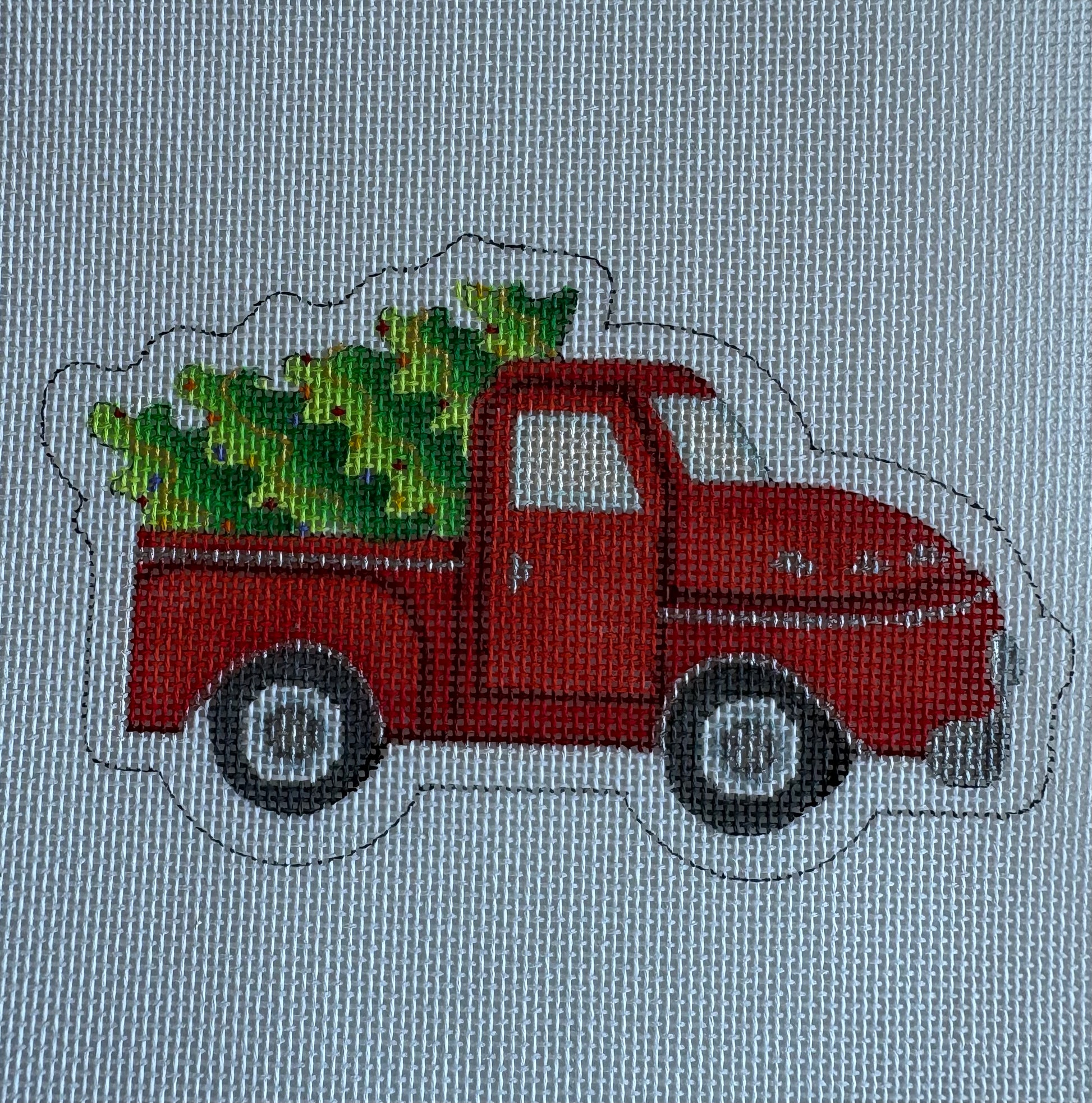 Red Pickup with Tree Ornament