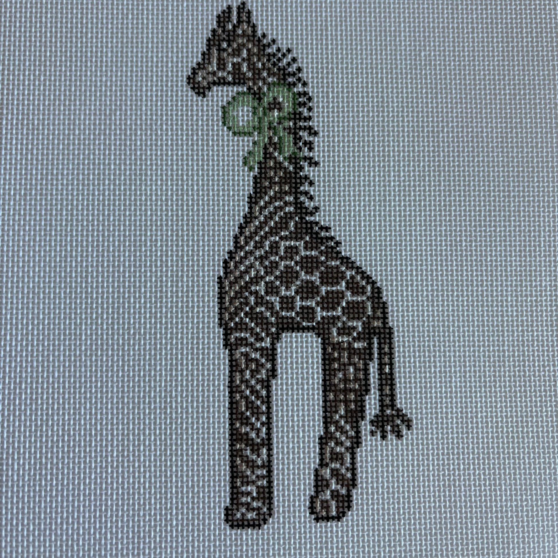 Grace the Giraffe with green bow