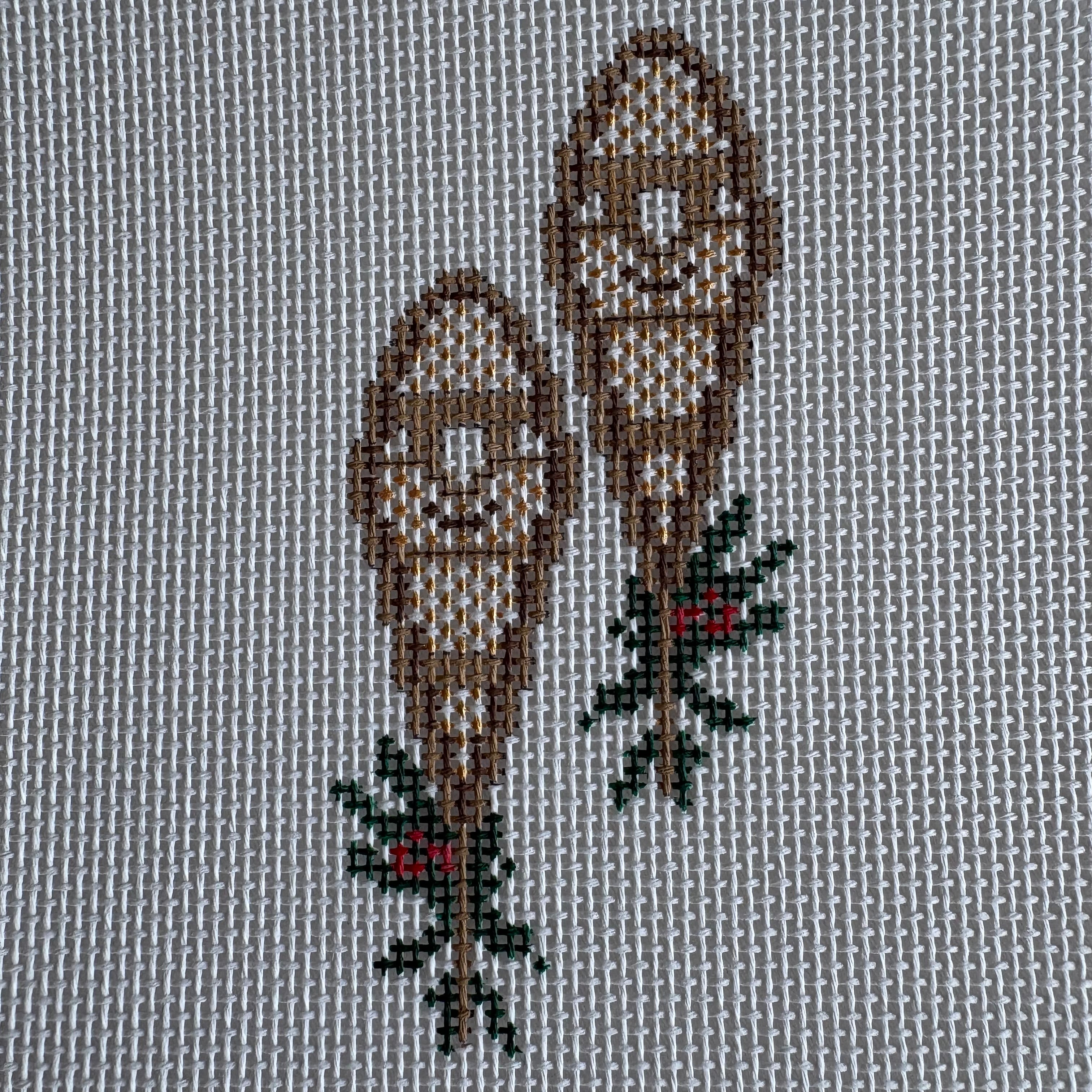 Snowshoes with holly