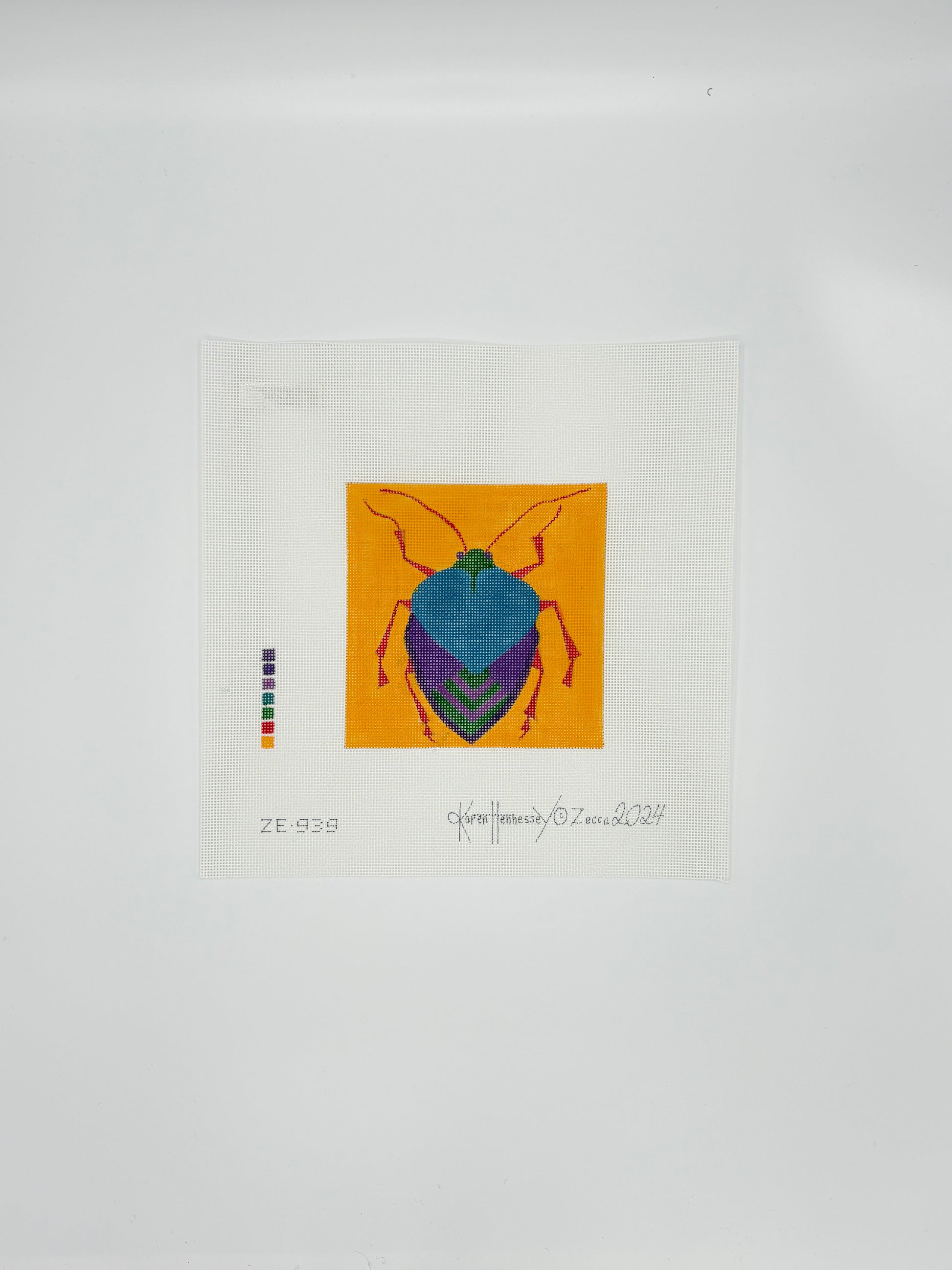Blue/Purple Bug on Orange