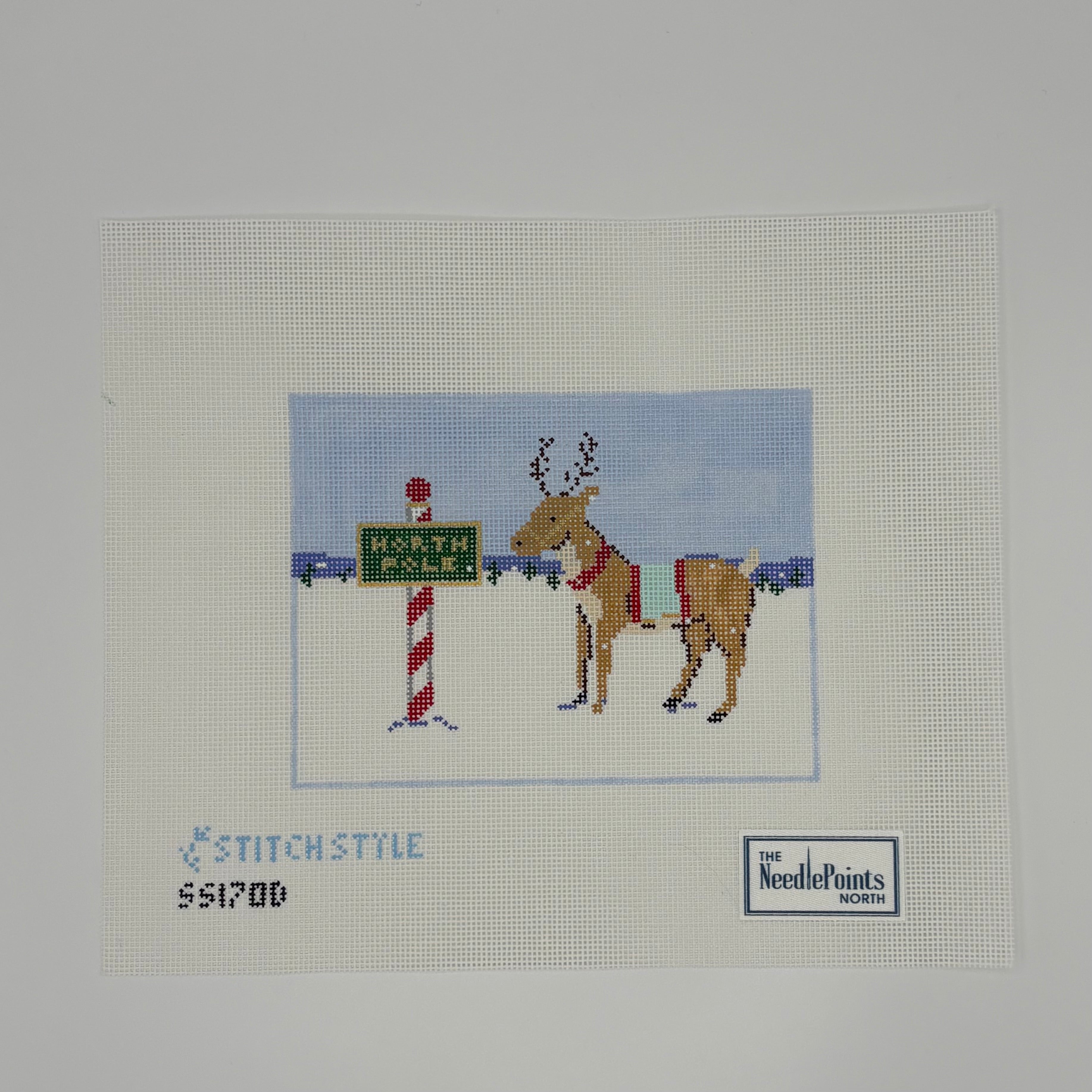 Reindeer and North Pole Sign