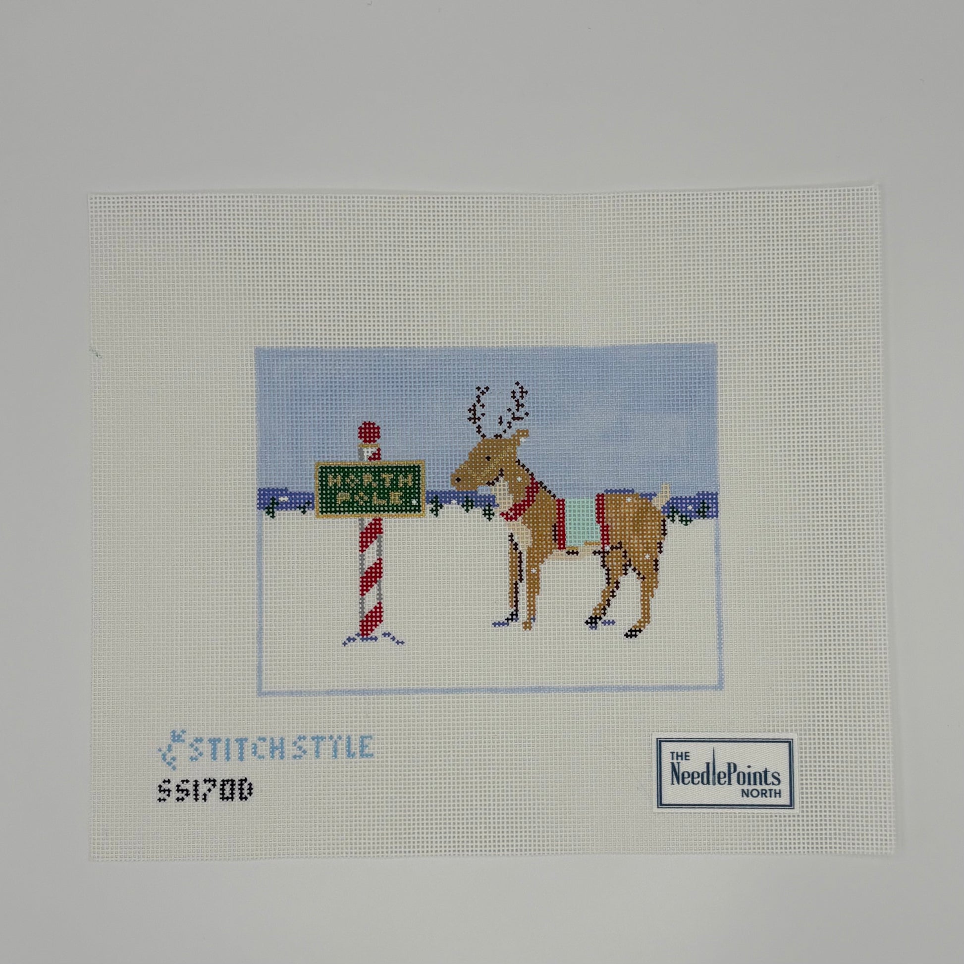 Reindeer and North Pole Sign