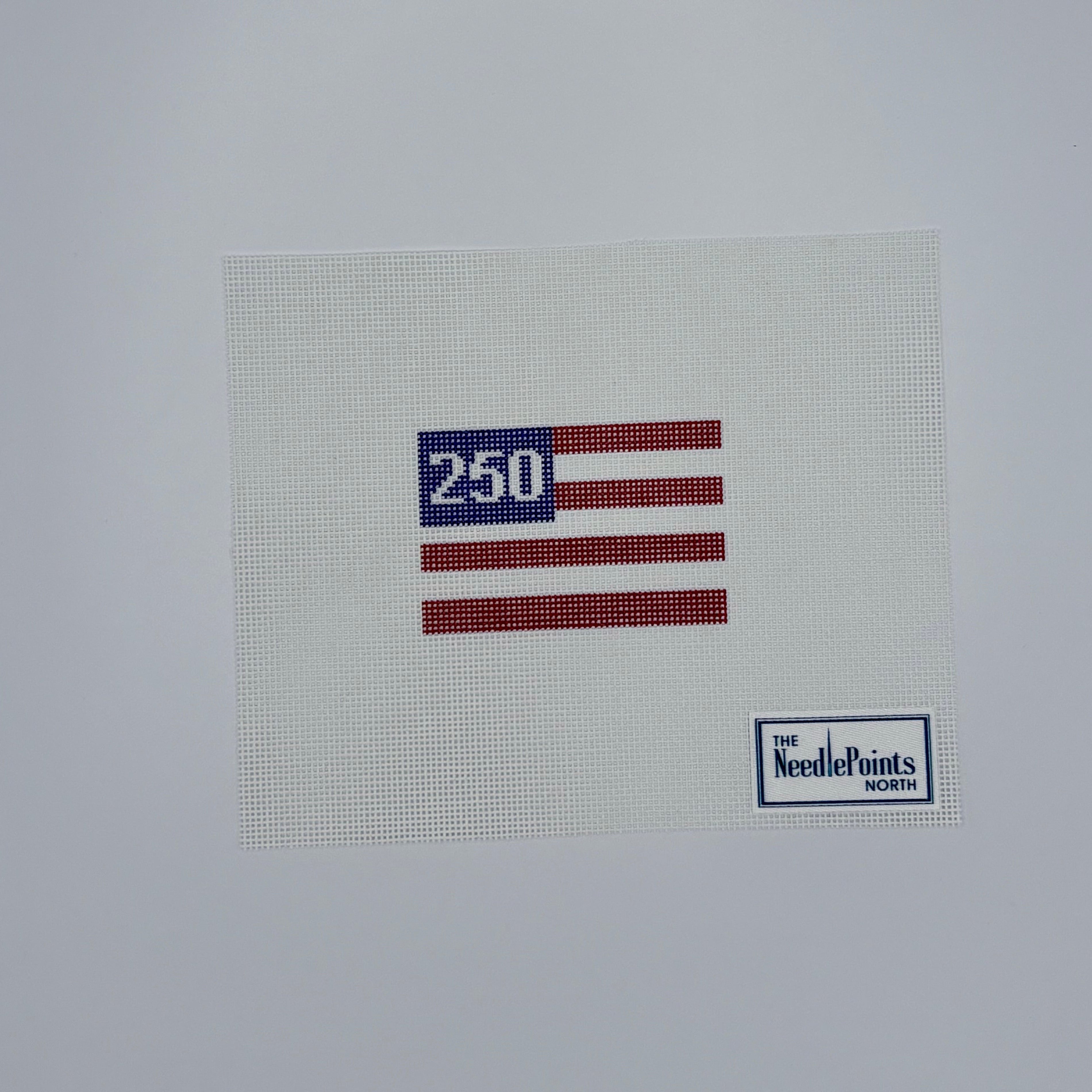 Cross-stitched American flag with number 250 on a white background, featuring 'The NeedlePoints North Shop' logo.
