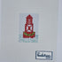 Printed canvas. Red bouy with garland in water