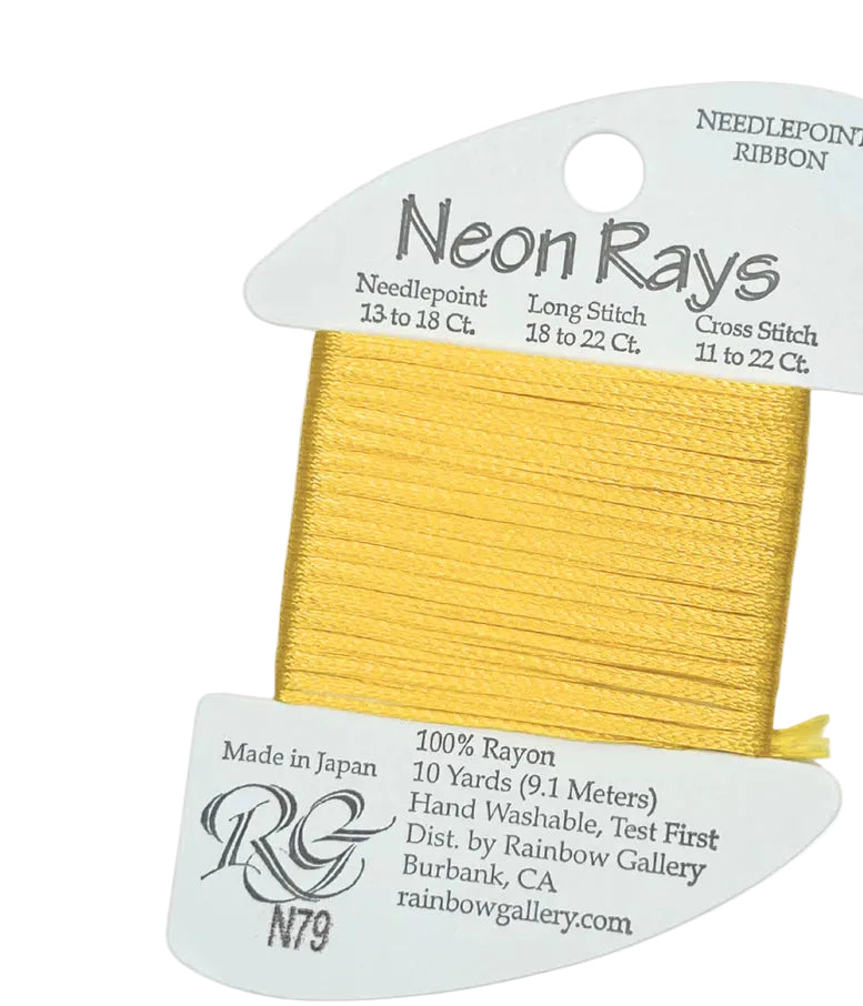 Neon Rays needlepoint ribbon in gold color with packaging on a white background