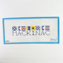 Needlepoint painted canvas with 'Mackinac' text and flag design on a white background